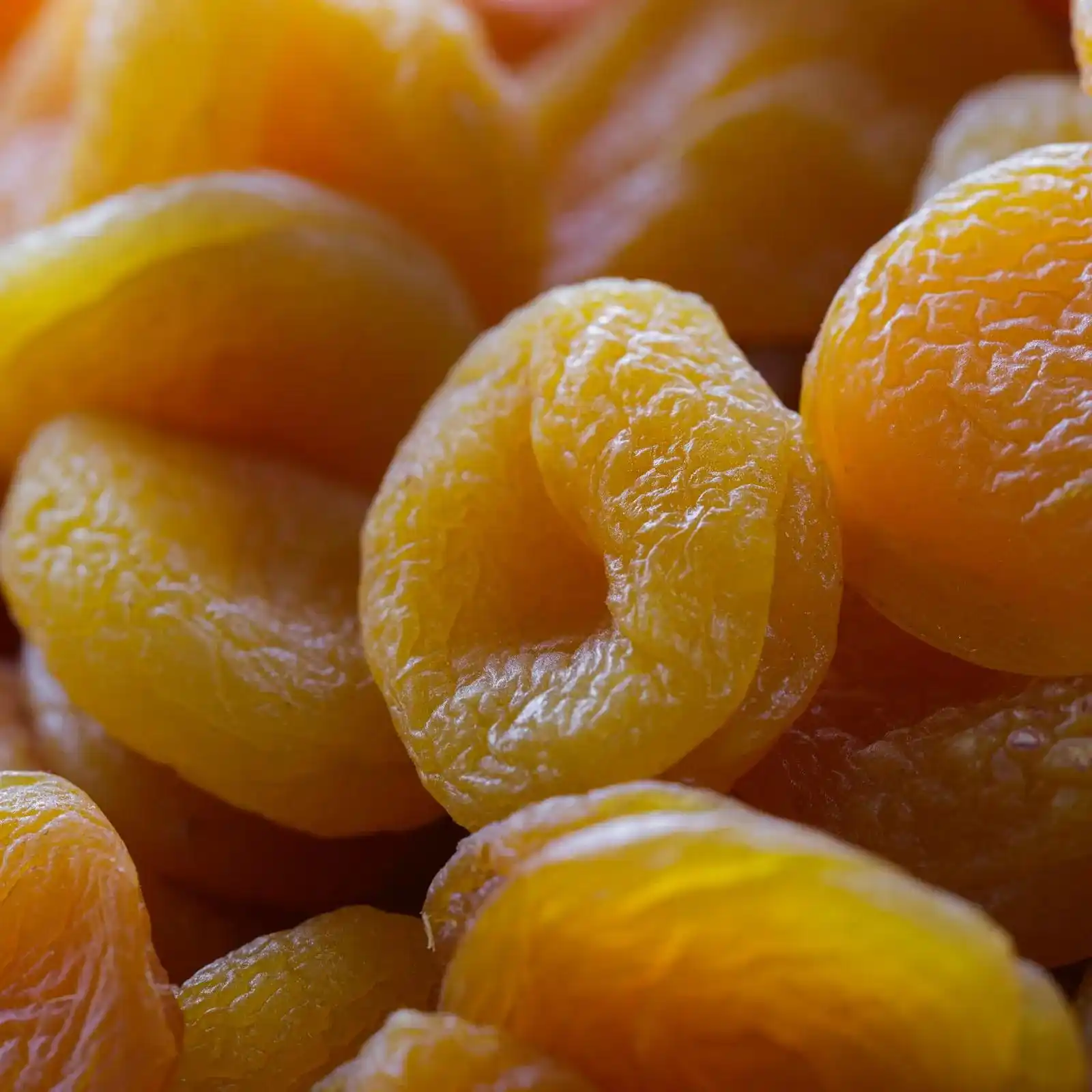 Orange dried apricots at a market